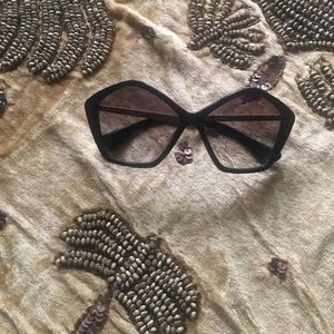 Miu Miu  by Prada sunglasses made in Italy